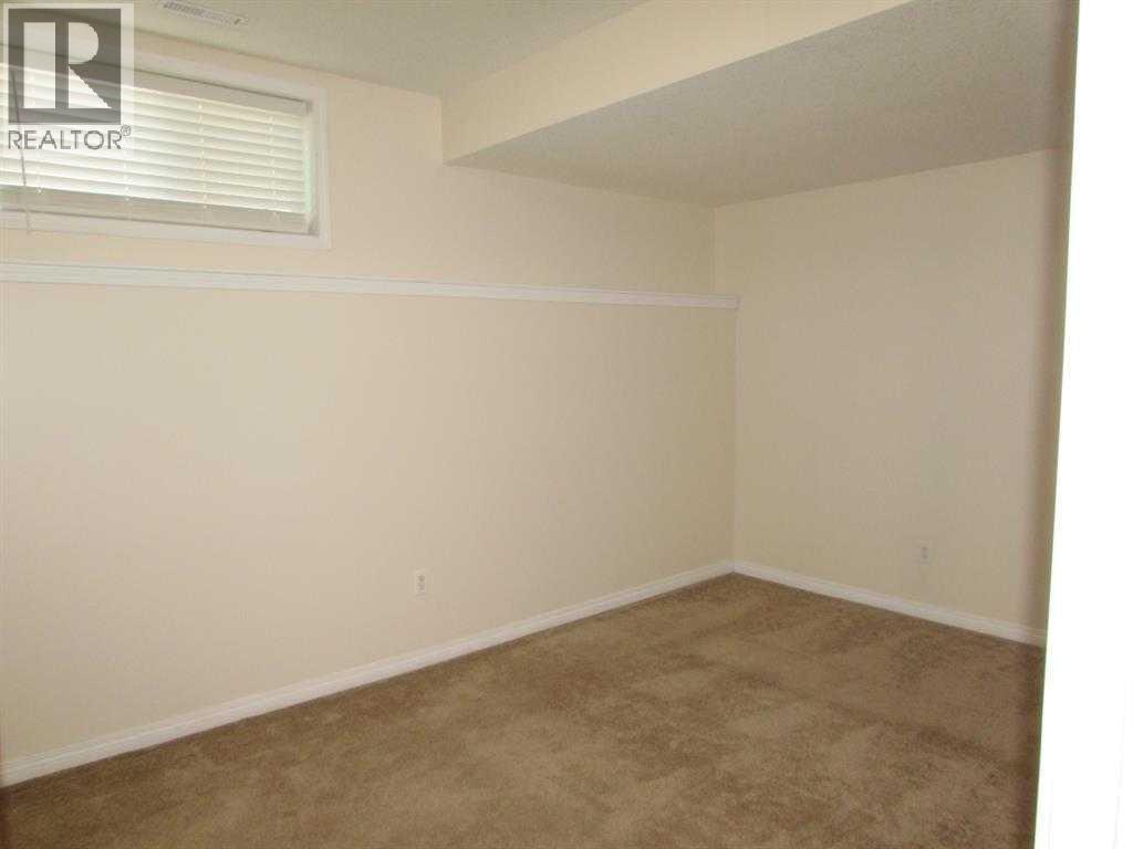 742 Carriage Lane Drive, Carstairs, Alberta T0M 0N0 - Photo 5 - A2264849