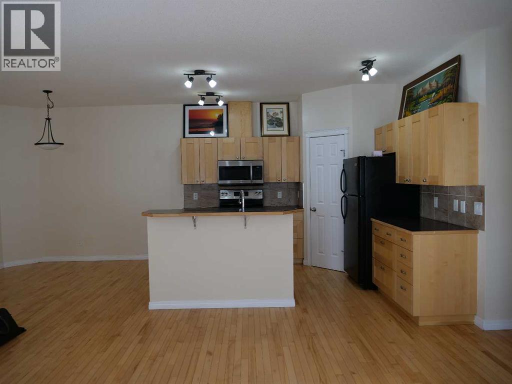 742 Carriage Lane Drive, Carstairs, Alberta T0M 0N0 - Photo 13 - A2264849