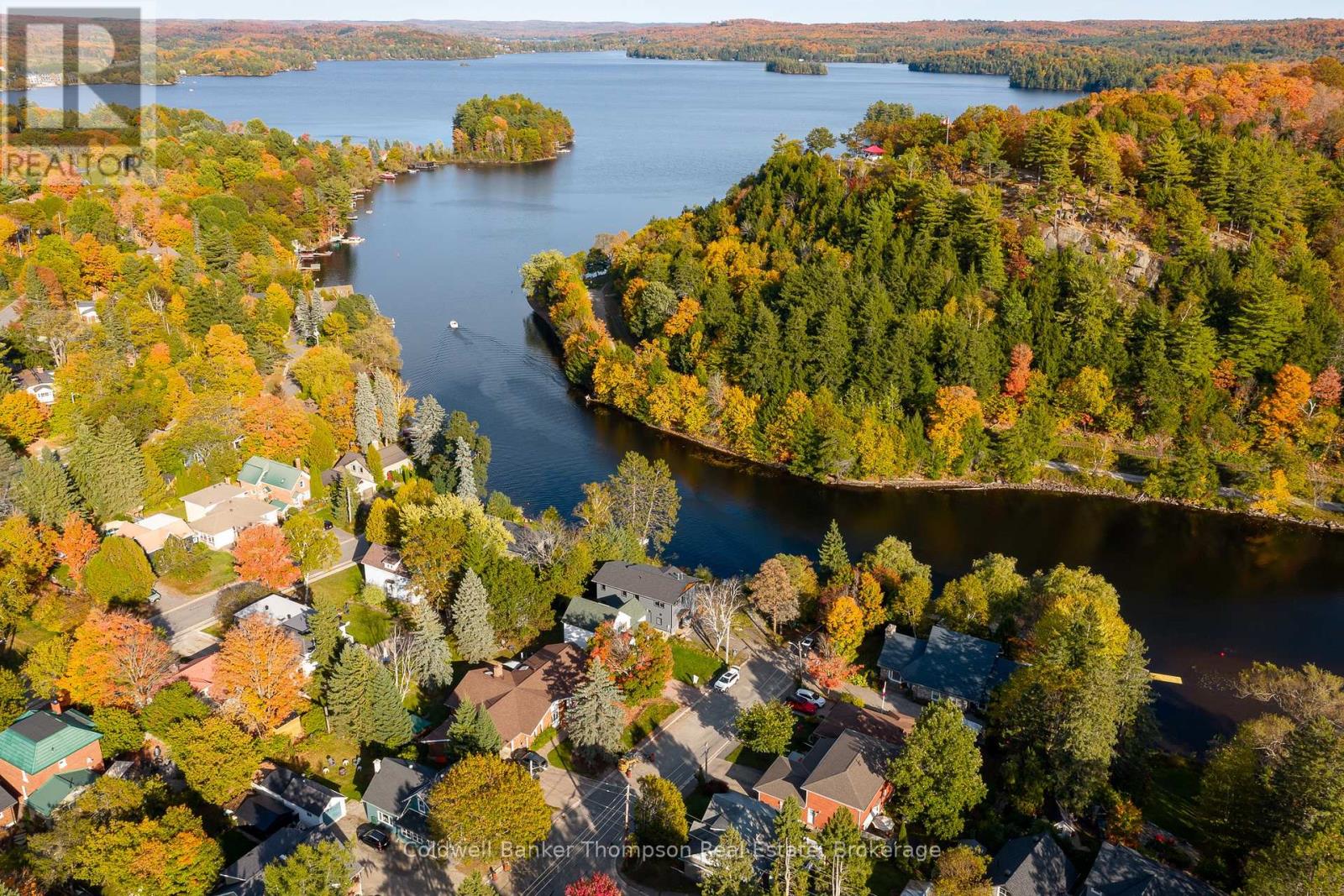 <div class="slider-price">$1,899,900</div><p>32 Church Street, Huntsville, Ontario</p>