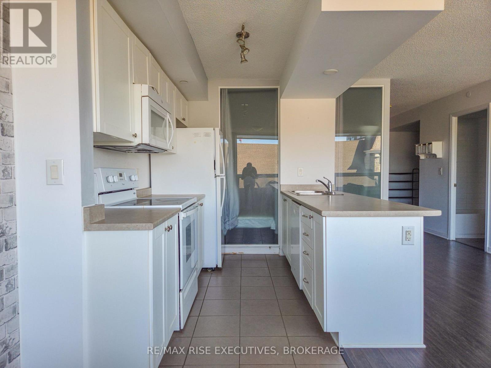 601 - 121 Queen Street, Kingston (East Of Sir John A. Blvd), Ontario  K7K 0G6 - Photo 12 - X12443379