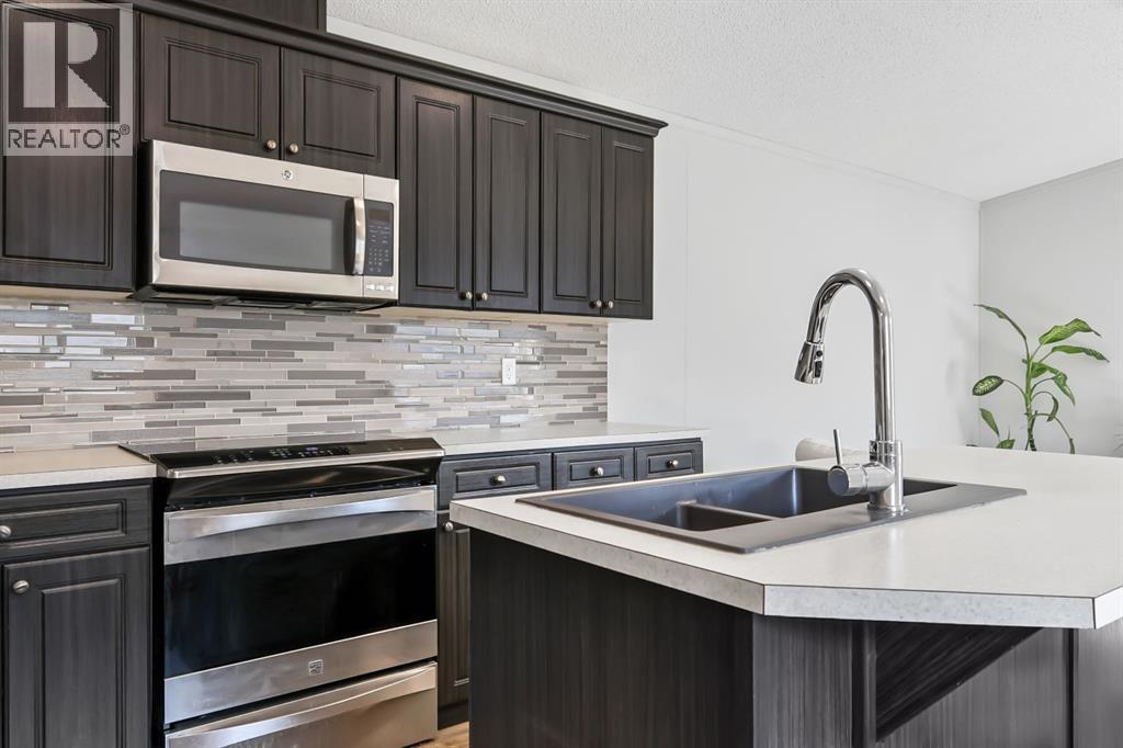 305 Stanley Avenue, Okotoks, Alberta  T1S 1M5 - Photo 9 - A2256943