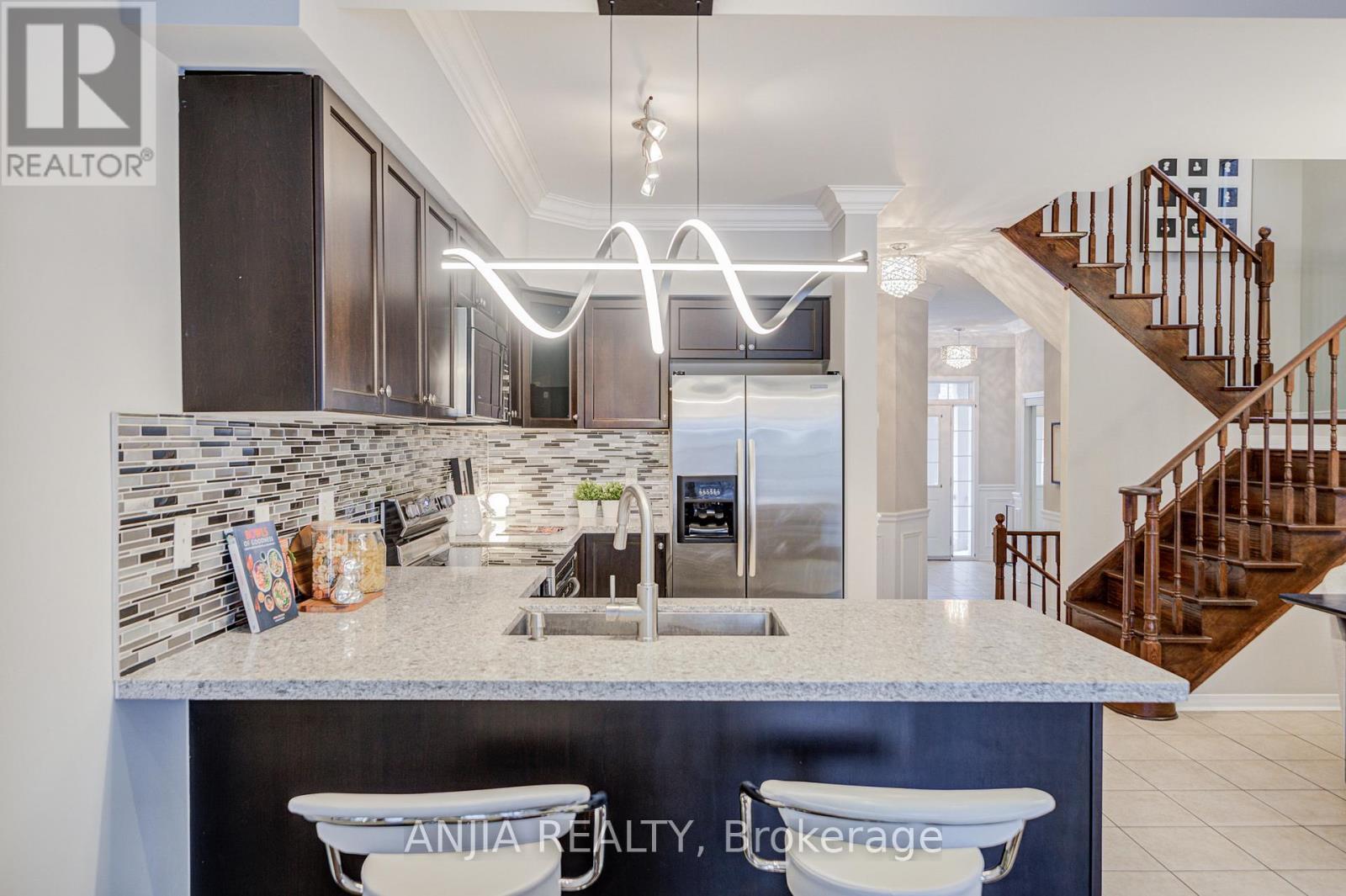 178 Roy Rainey Avenue, Markham (Wismer), Ontario  L6E 1C6 - Photo 11 - N12627276