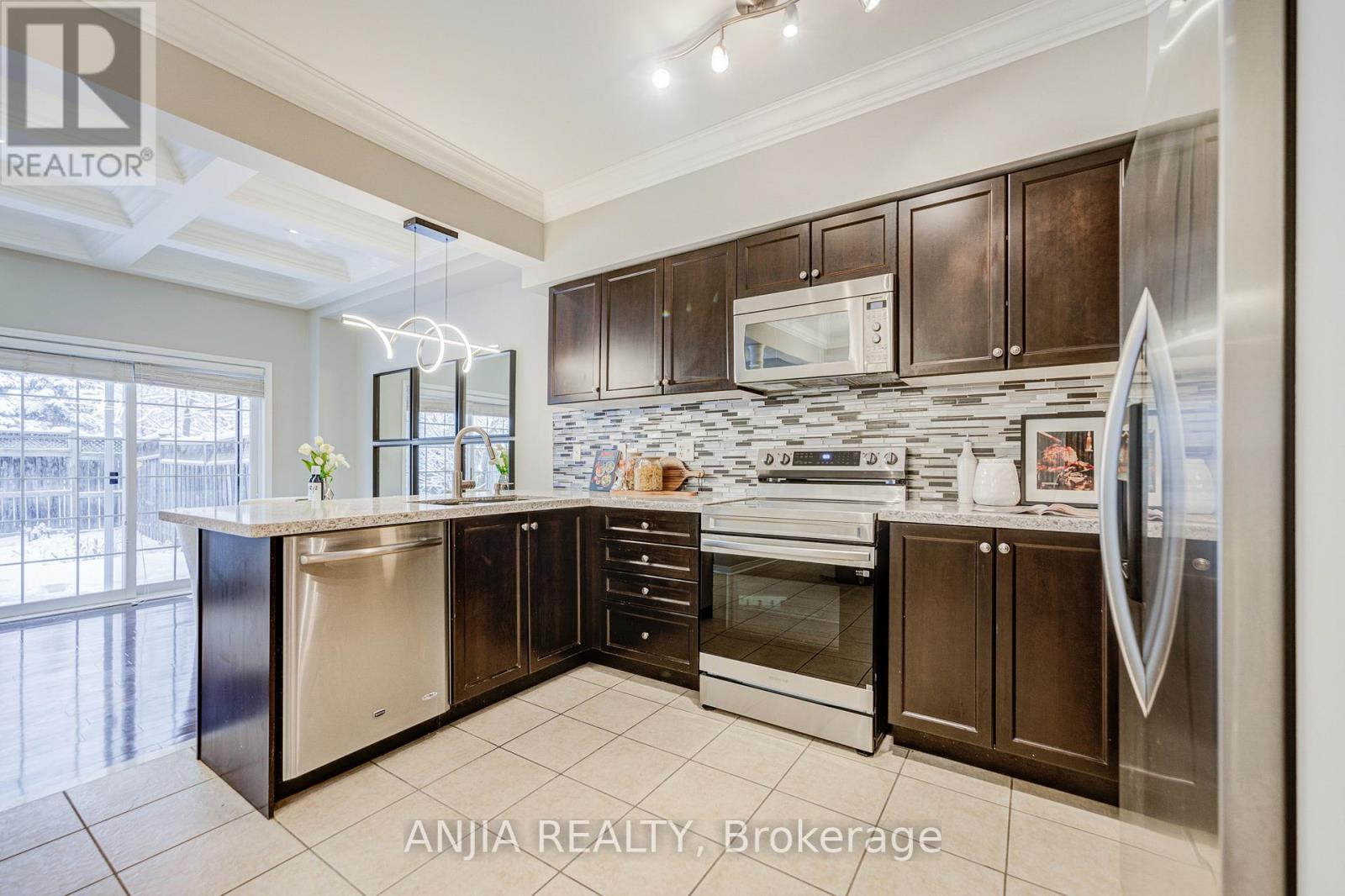 178 Roy Rainey Avenue, Markham (Wismer), Ontario  L6E 1C6 - Photo 8 - N12627276