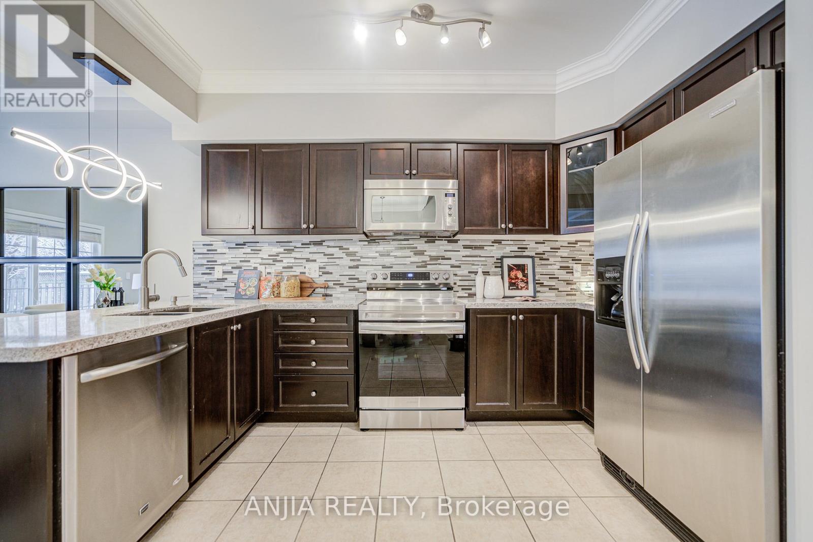 178 Roy Rainey Avenue, Markham (Wismer), Ontario  L6E 1C6 - Photo 9 - N12627276