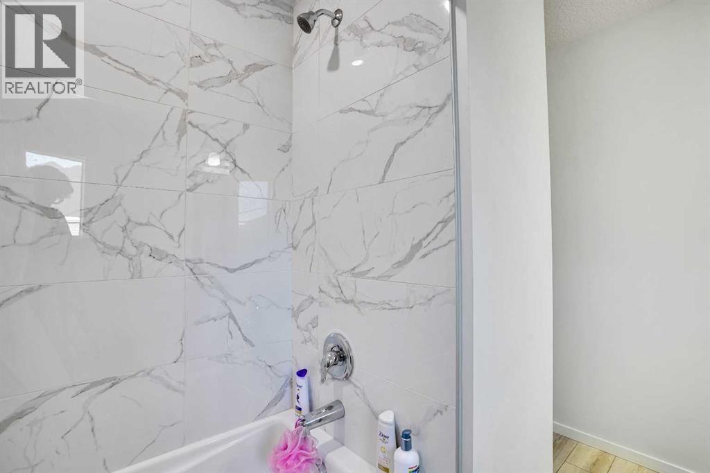 216 Windbury Lane Sw, Airdrie, Alberta  T4B 5J5 - Photo 9 - A2254841