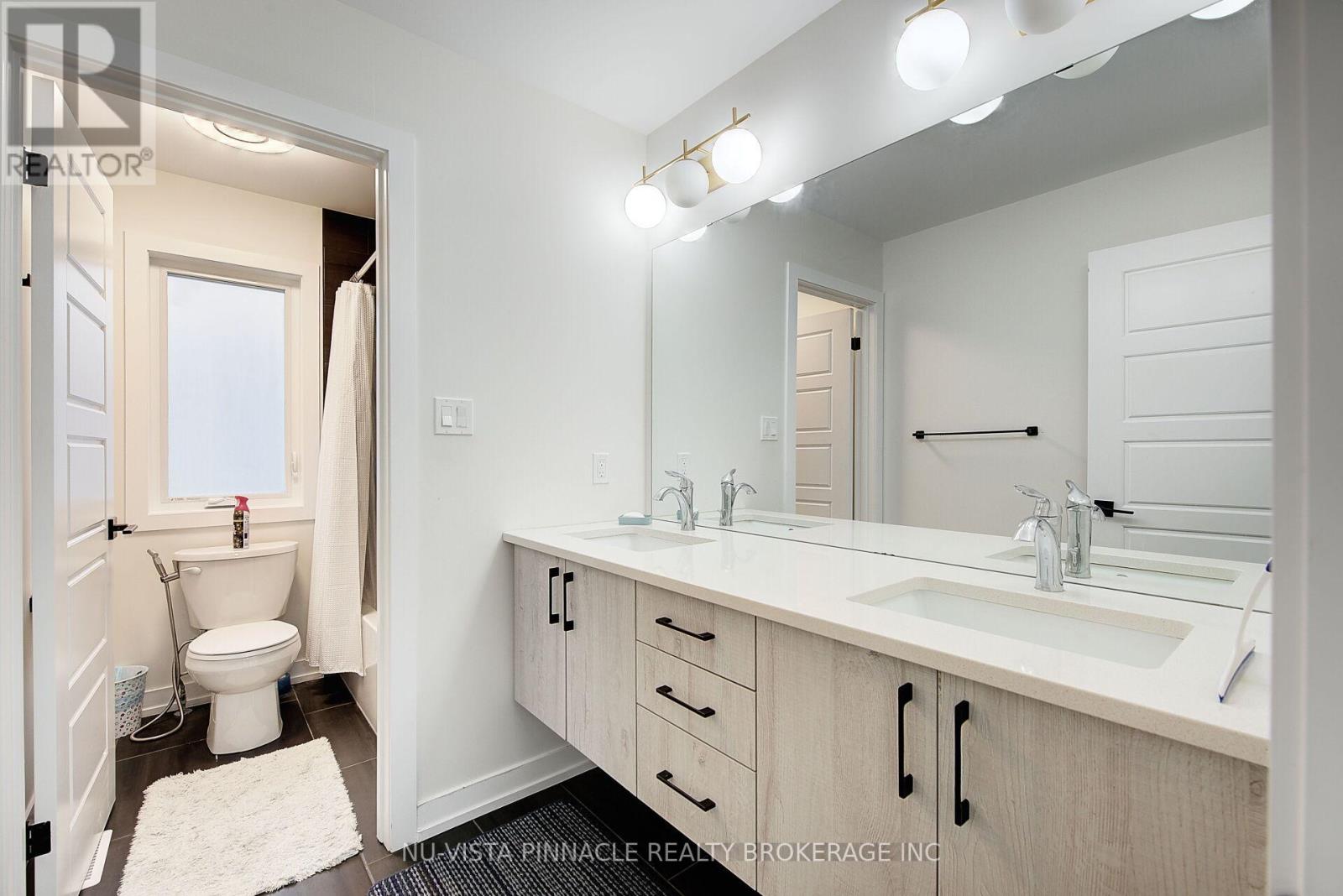 1895 Fountain Grass Drive, London South, Ontario  N6K 0M2 - Photo 33 - X12627510