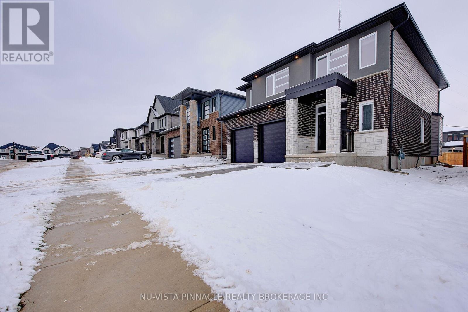 1895 Fountain Grass Drive, London South, Ontario  N6K 0M2 - Photo 4 - X12627510