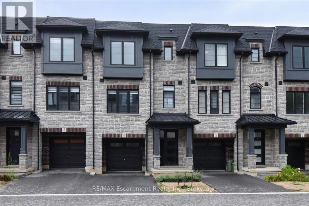 <div class="slider-price">$729,997</div><p>4 - 187 Wilson Street W, Hamilton, Ontario</p>