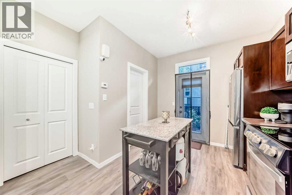 49 New Brighton Point Se, Calgary, Alberta  T2Z 1B6 - Photo 5 - A2259395