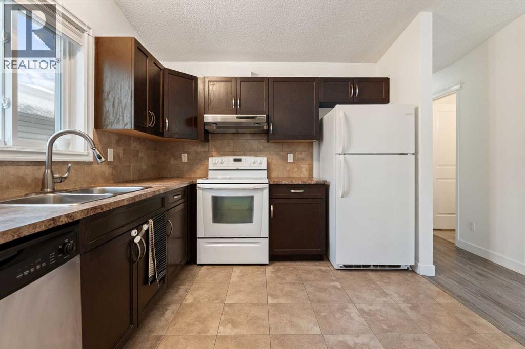 15 Shawinigan Rise Sw, Calgary, Alberta  T2Y 1Z7 - Photo 6 - A2274256