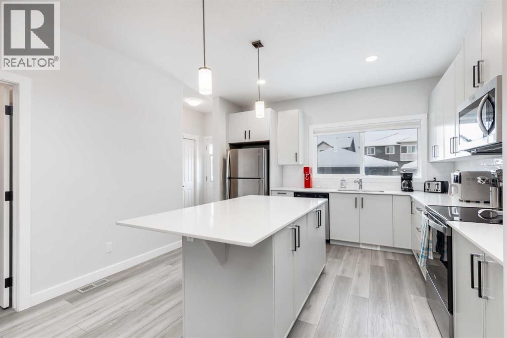 226 Midgrove Mews Sw, Airdrie, Alberta  T4B 5K7 - Photo 4 - A2274679