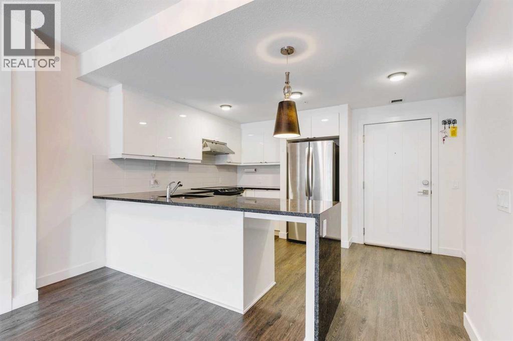 103, 25 Aspenmont Heights Sw, Calgary, Alberta T3H 0E4 - Photo 2 - A2274638