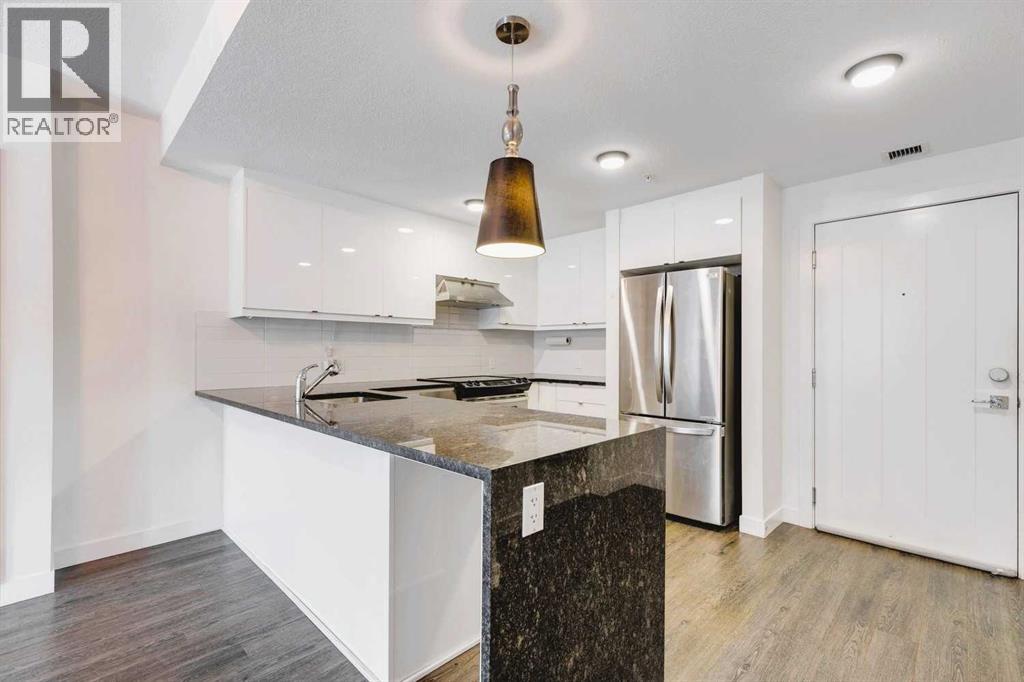 103, 25 Aspenmont Heights Sw, Calgary, Alberta T3H 0E4 - Photo 3 - A2274638