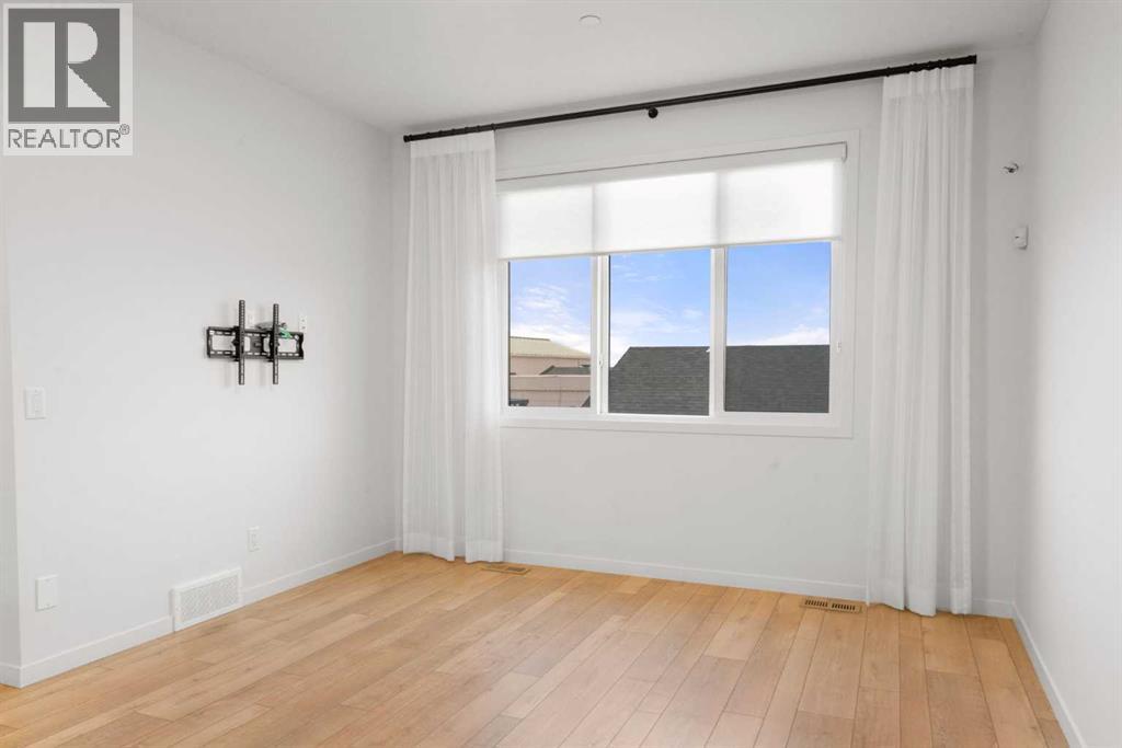 76 Lucas Common Nw, Calgary, Alberta  T3P 2B4 - Photo 12 - A2271463