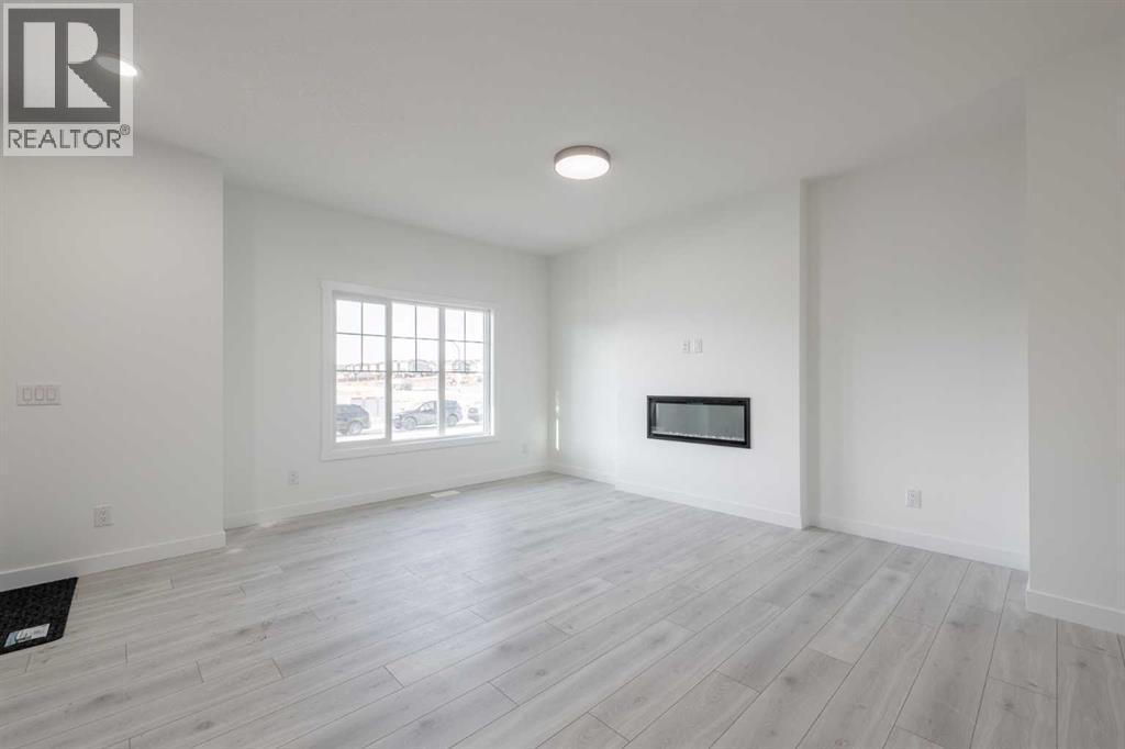 19 Appaloosa Way, Cochrane, Alberta T4C 2M3 - Photo 5 - A2274581