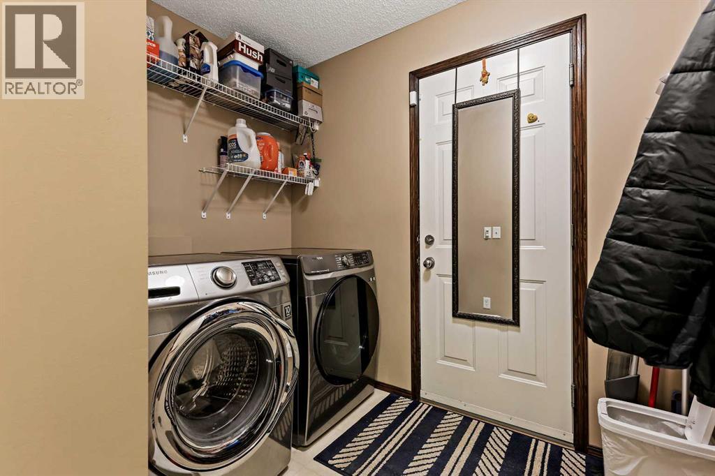 1976 New Brighton Drive Se, Calgary, Alberta T2Z 4G7 - Photo 16 - A2274819