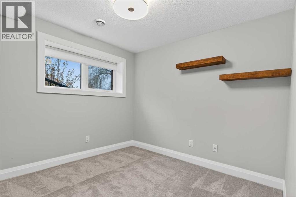 3704 58 Avenue Sw, Calgary, Alberta  T3E 5H6 - Photo 36 - A2270110
