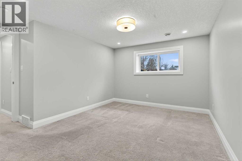 3704 58 Avenue Sw, Calgary, Alberta  T3E 5H6 - Photo 43 - A2270110
