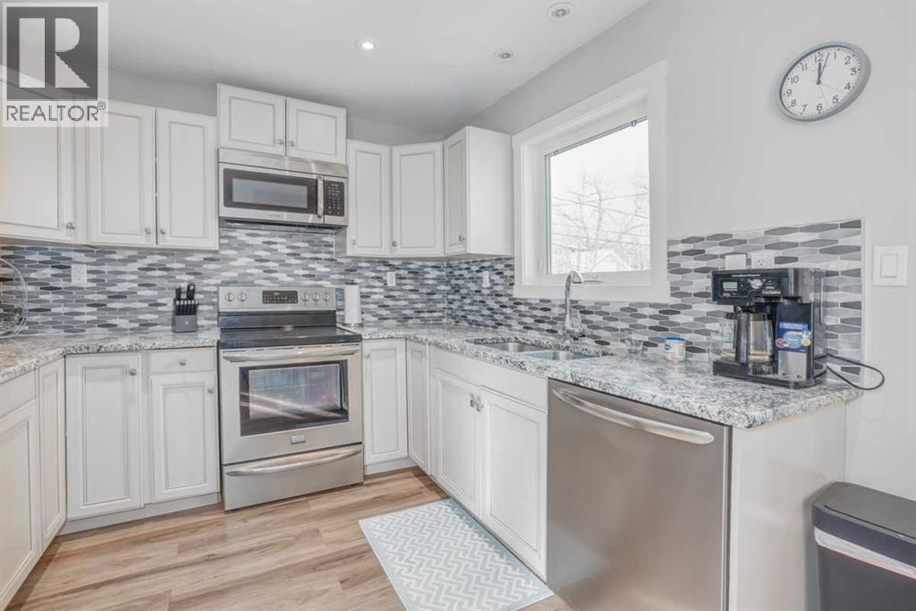 25 Highwood Place Nw, Calgary, Alberta T2K 2B9 - Photo 28 - A2270274