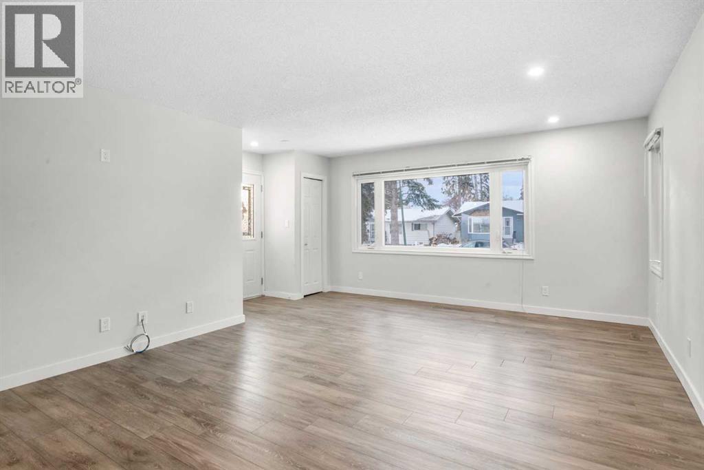 68 Healy Drive Sw, Calgary, Alberta  T2V 2Z7 - Photo 6 - A2274429