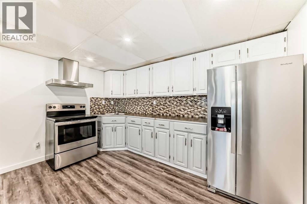 20 Westland Gate, Okotoks, Alberta  T1S 1N1 - Photo 28 - A2244976