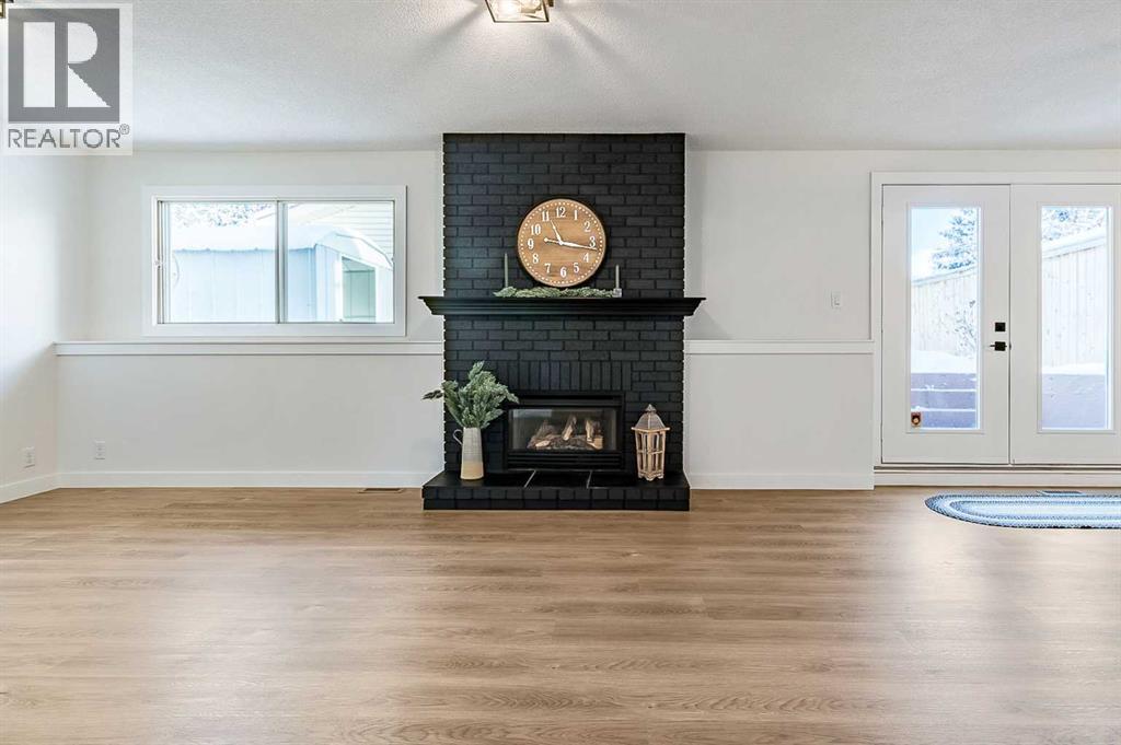 15 Woodford Crescent Sw, Calgary, Alberta T2W 4C5 - Photo 21 - A2272502