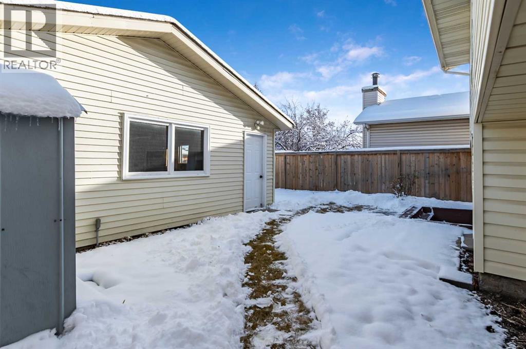 15 Woodford Crescent Sw, Calgary, Alberta T2W 4C5 - Photo 34 - A2272502