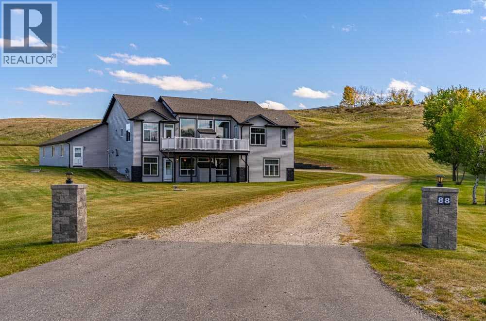 88 Sharp Hill Drive, Rural Rocky View County, Alberta  T4A 0P4 - Photo 2 - A2259077