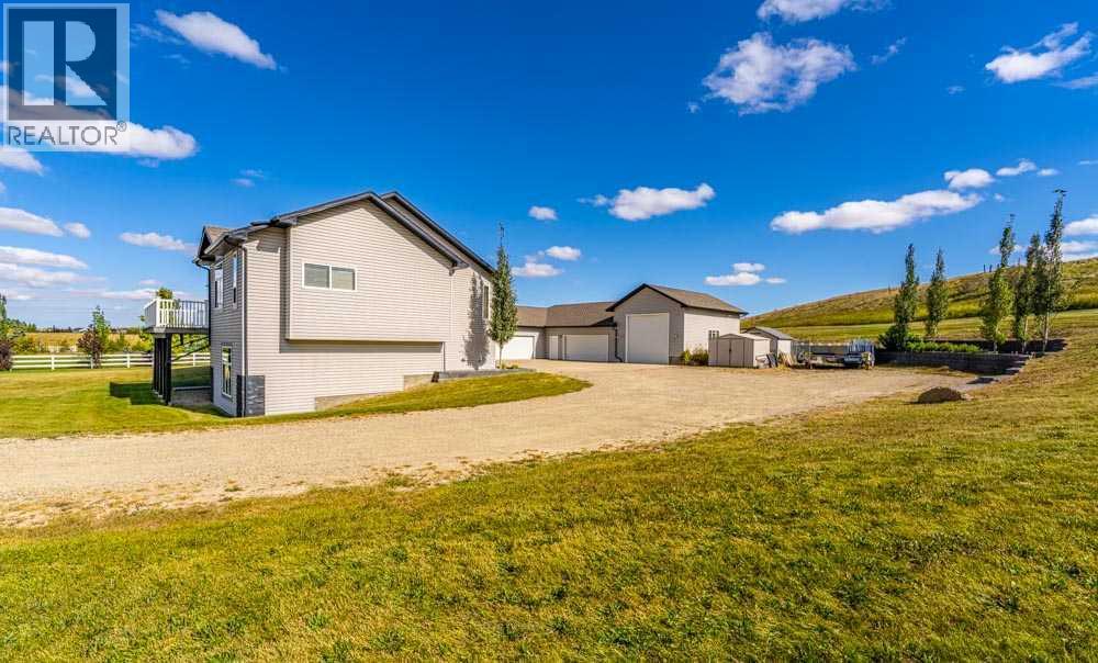 88 Sharp Hill Drive, Rural Rocky View County, Alberta  T4A 0P4 - Photo 3 - A2259077