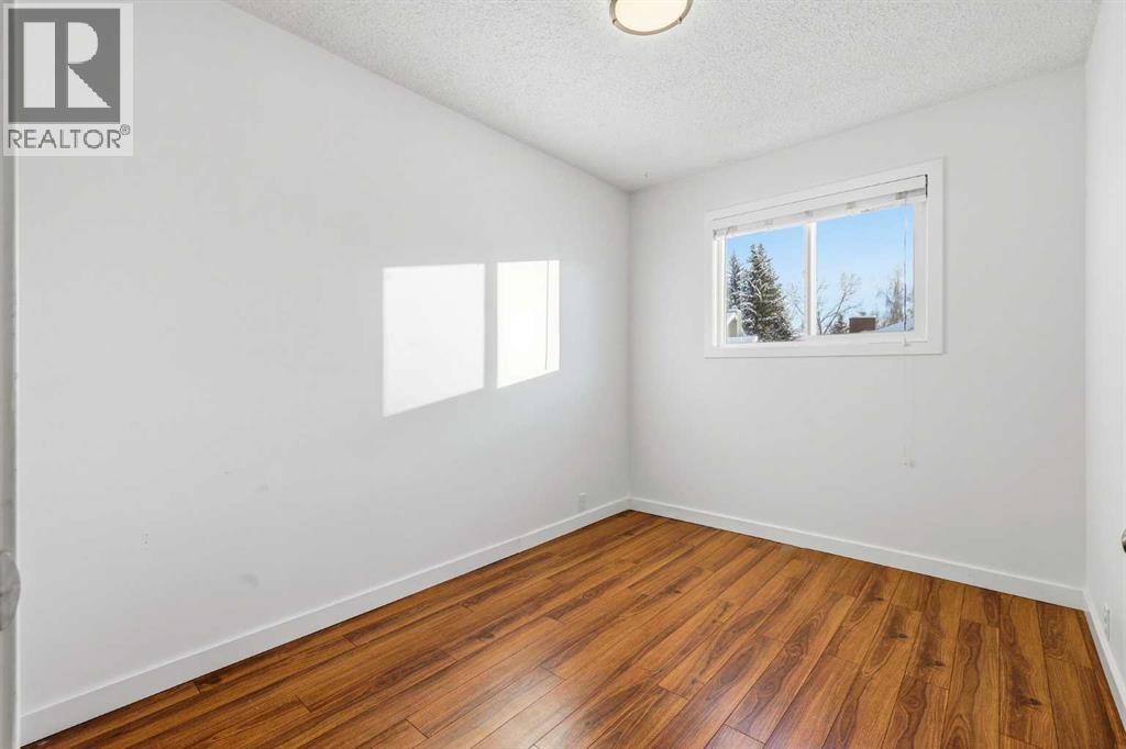 2 Woodfern Road Sw, Calgary, Alberta  T2W 4K9 - Photo 19 - A2273146