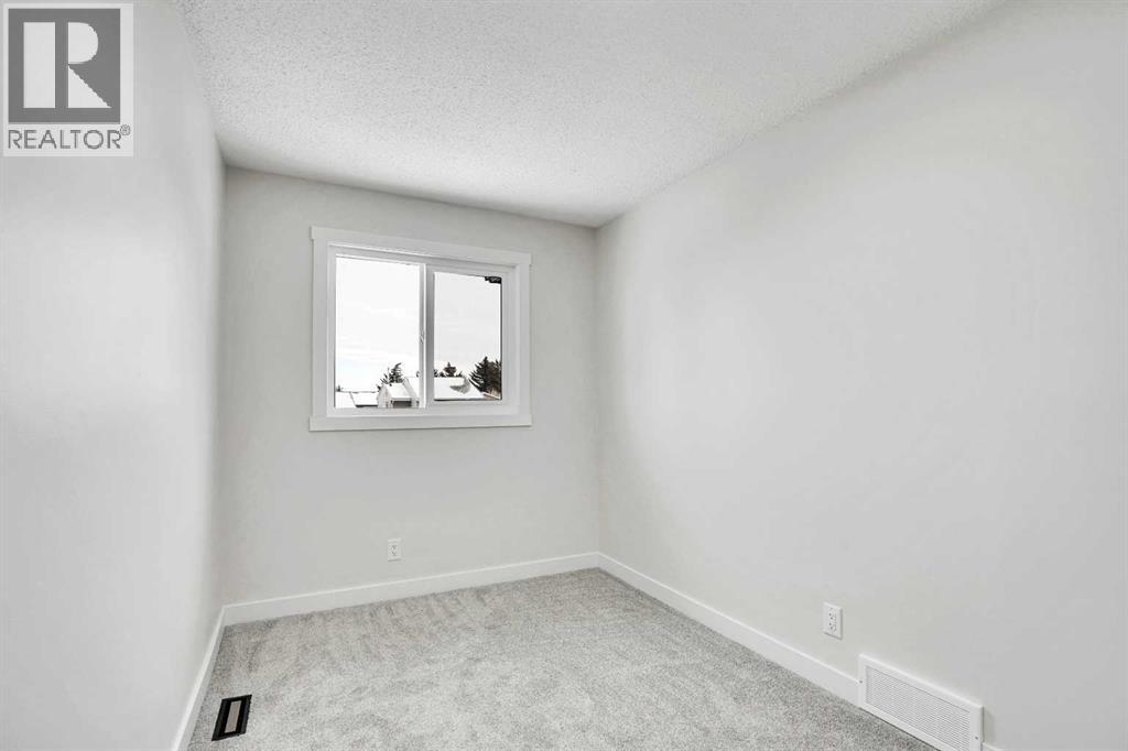 309 Falwood Way Ne, Calgary, Alberta T3J 1A9 - Photo 17 - A2274902