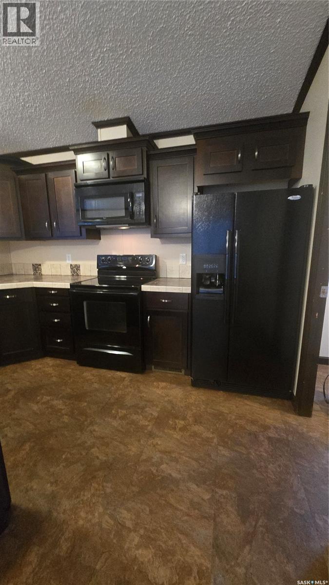132 Fuller Crescent, Carievale, Saskatchewan  S0C 0P0 - Photo 4 - SK025548
