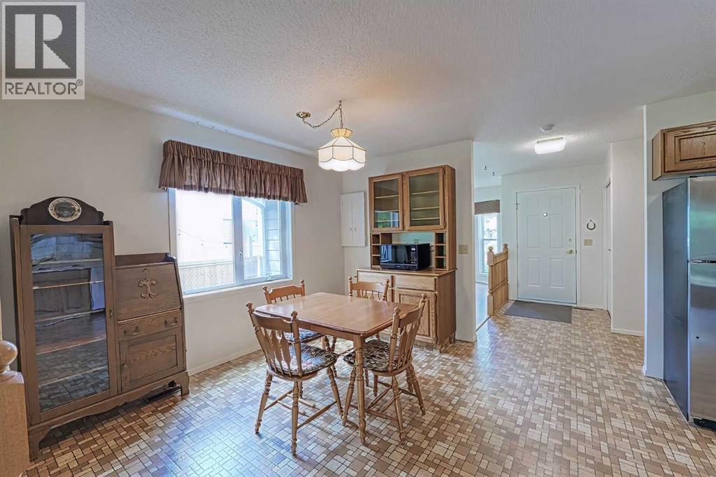 21 Welch Crescent, Okotoks, Alberta  T1S 1H2 - Photo 10 - A2267390