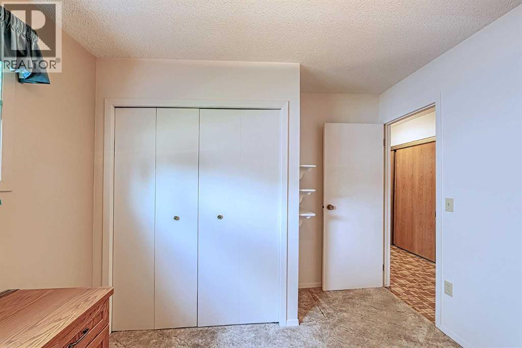 21 Welch Crescent, Okotoks, Alberta  T1S 1H2 - Photo 17 - A2267390