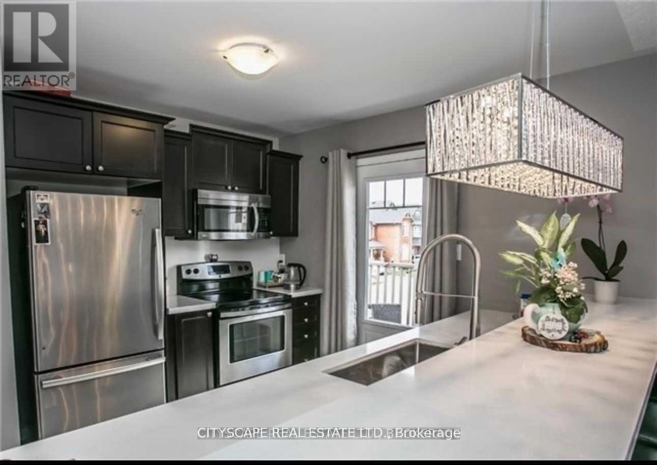 1023 Stemman Place, Milton, Ontario  L9T 8R1 - Photo 4 - W12629320