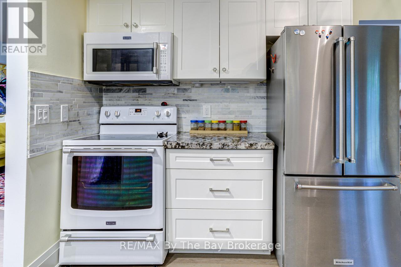 63 Rodrium Road, Wasaga Beach, Ontario L9Z 1R5 - Photo 18 - S12387914