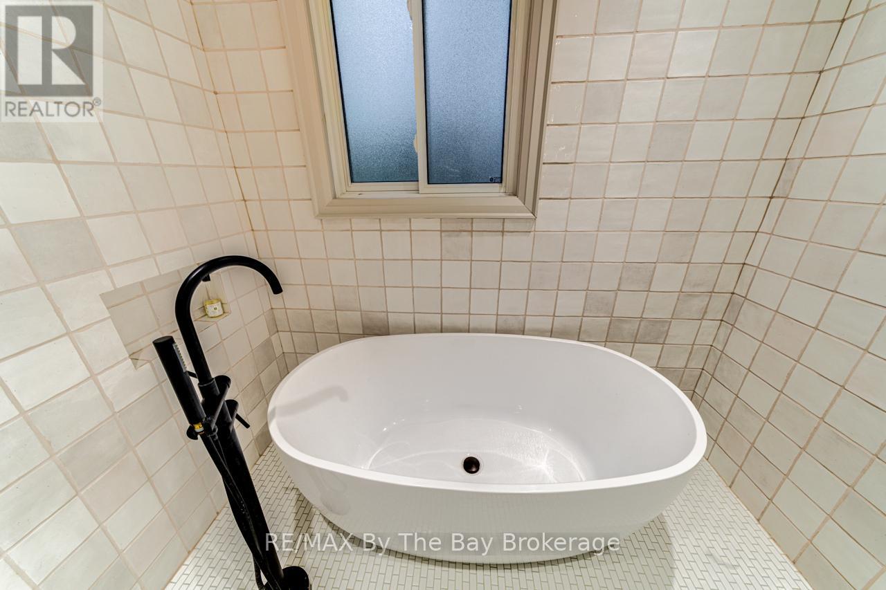 63 Rodrium Road, Wasaga Beach, Ontario L9Z 1R5 - Photo 39 - S12387914