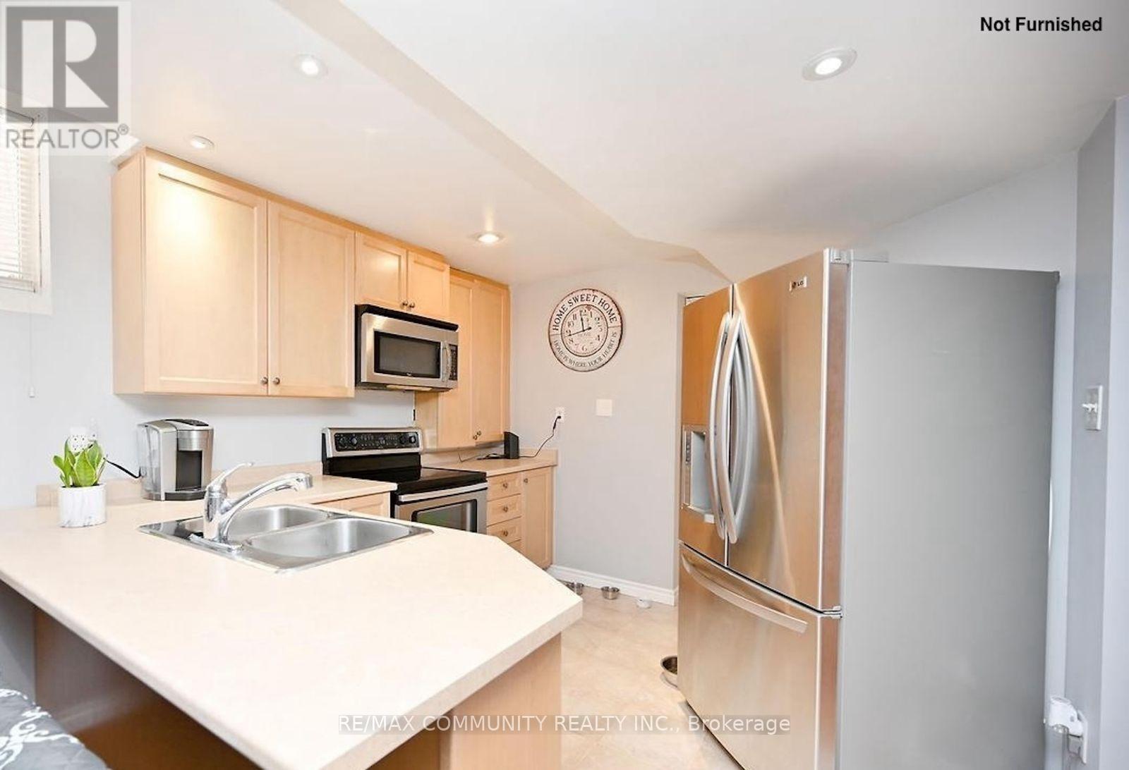 13 Marotta Avenue, Brampton (Fletcher's Meadow), Ontario  L6X 4W9 - Photo 2 - W12629506