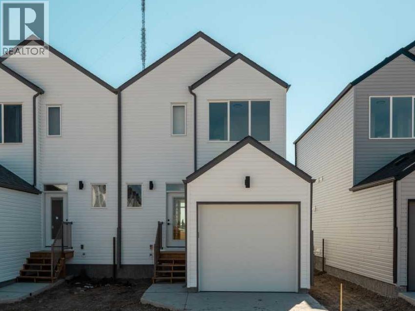 677 Blackwolf Boulevard N, Lethbridge, Alberta T1H 7H7 - Photo 3 - A2223582