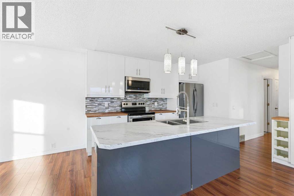 2 Woodfern Road Sw, Calgary, Alberta  T2W 4K9 - Photo 9 - A2273146