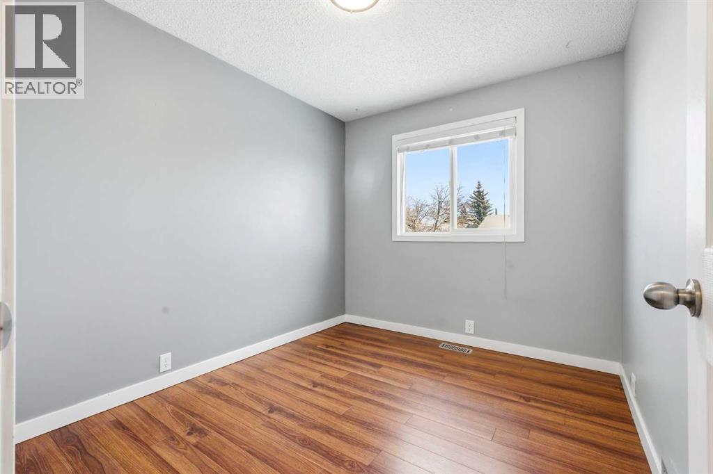 2 Woodfern Road Sw, Calgary, Alberta  T2W 4K9 - Photo 23 - A2273146