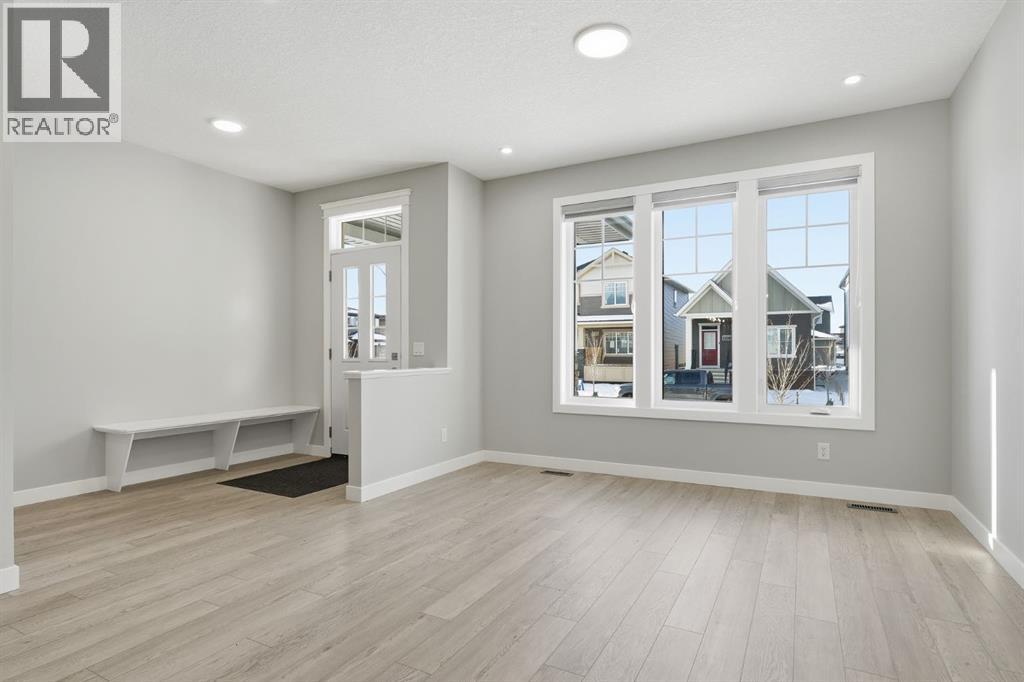 936 Reynolds Lane Sw, Airdrie, Alberta  T4B 5L7 - Photo 4 - A2274664