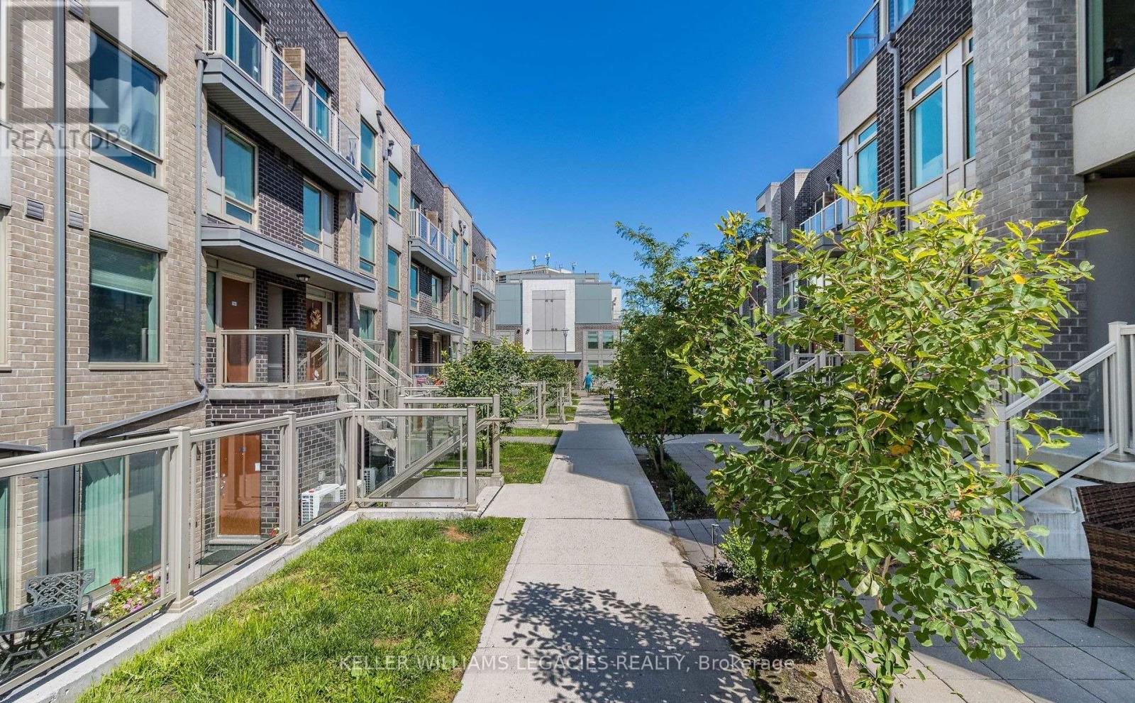 107 - 7 Applewood Lane, Toronto, Ontario M9C 2Z7 - Photo 2 - W12557356