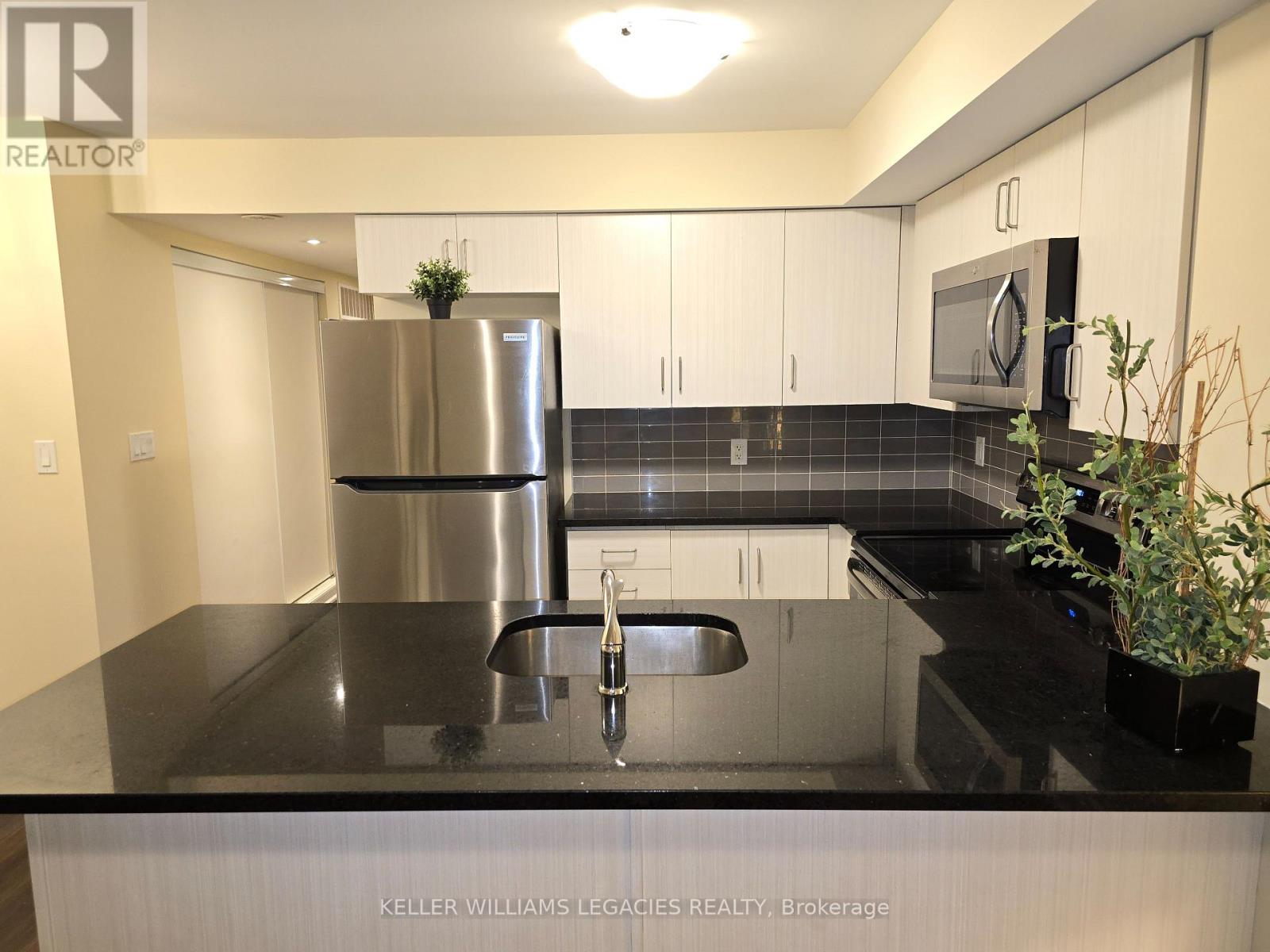 107 - 7 Applewood Lane, Toronto, Ontario M9C 2Z7 - Photo 7 - W12557356