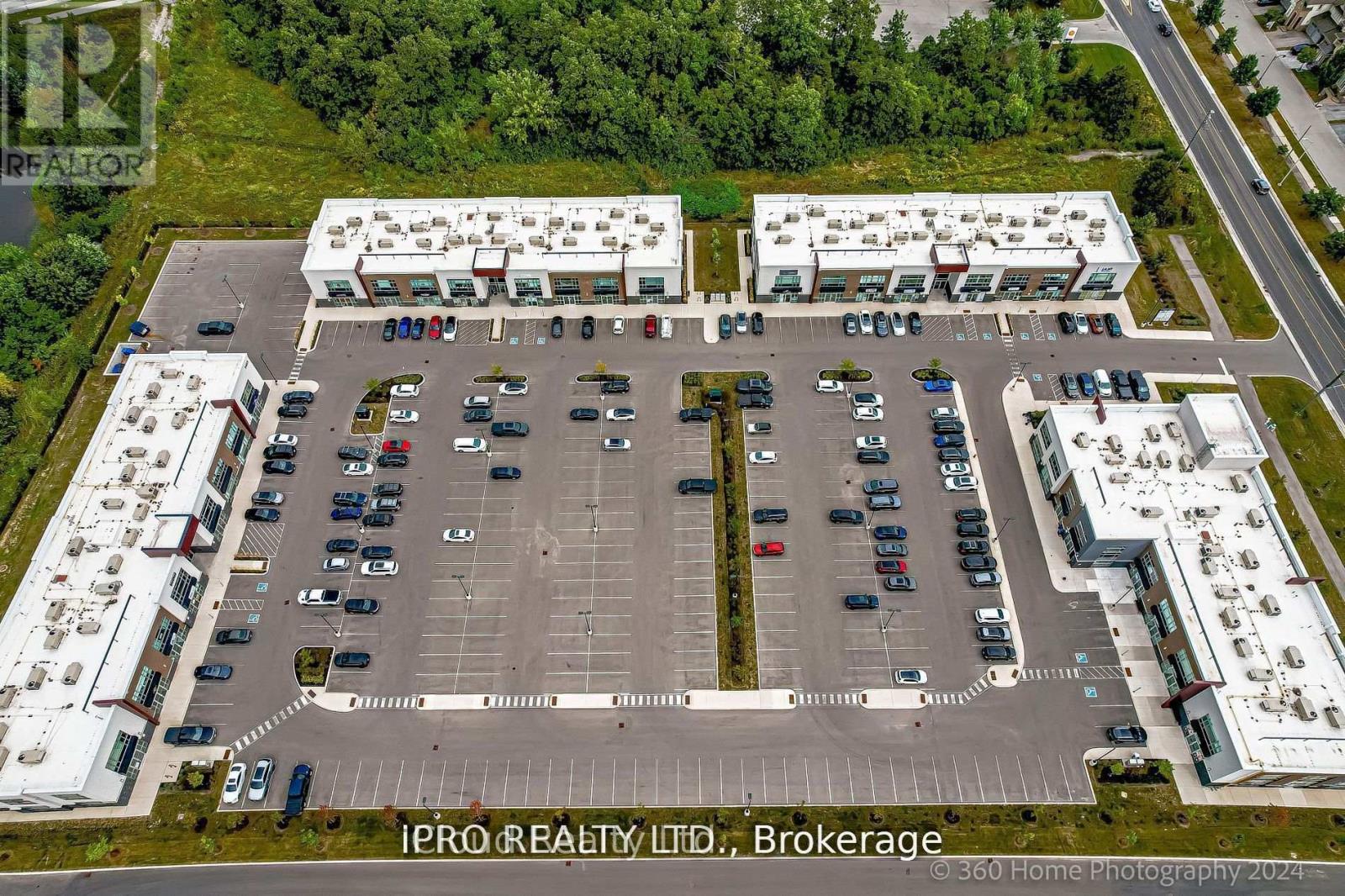 102 - 3475 Rebecca Street, Oakville, Ontario  L6L 0H3 - Photo 4 - W12429856