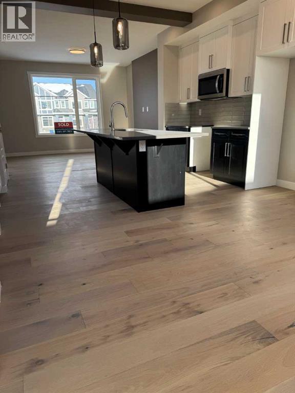 105 Cobbestone Gate Sw, Airdrie, Alberta  T4B 0R7 - Photo 5 - A2274503