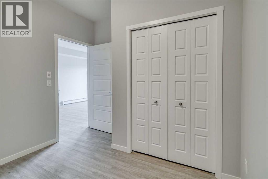 215, 300 Harvest Hills Place Ne, Calgary, Alberta  T3K 2P4 - Photo 11 - A2247917