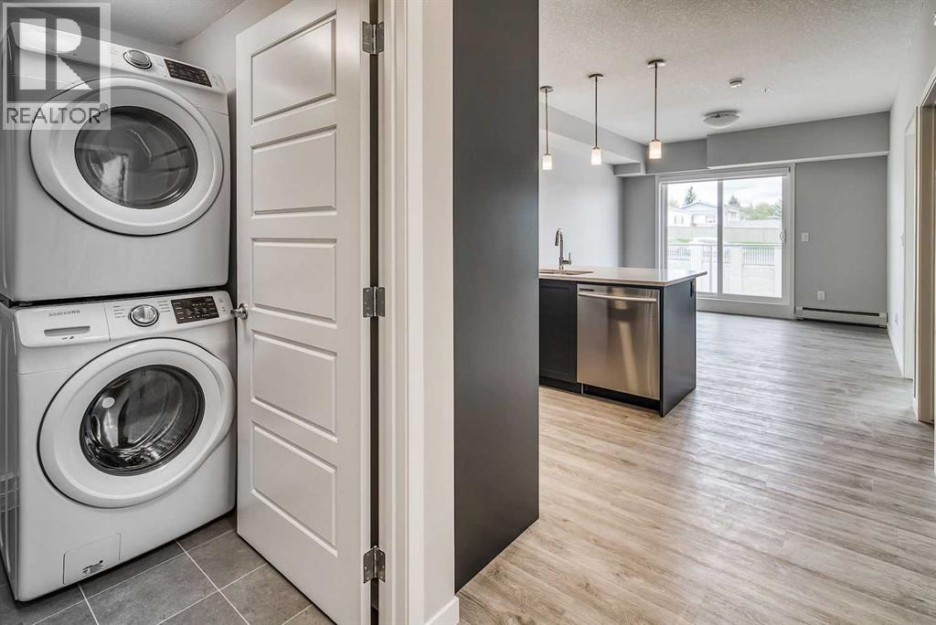 215, 300 Harvest Hills Place Ne, Calgary, Alberta  T3K 2P4 - Photo 6 - A2247917