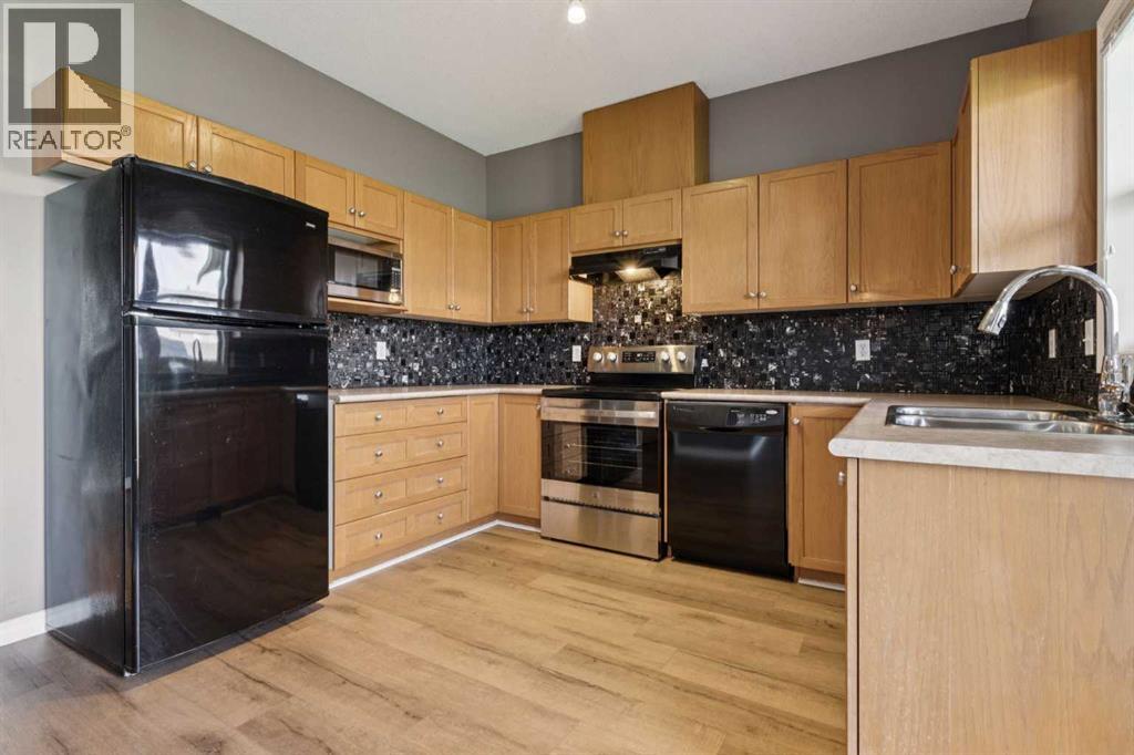 104, 2001 Luxstone Boulevard Sw, Airdrie, Alberta  T4B 2Y6 - Photo 6 - A2254513