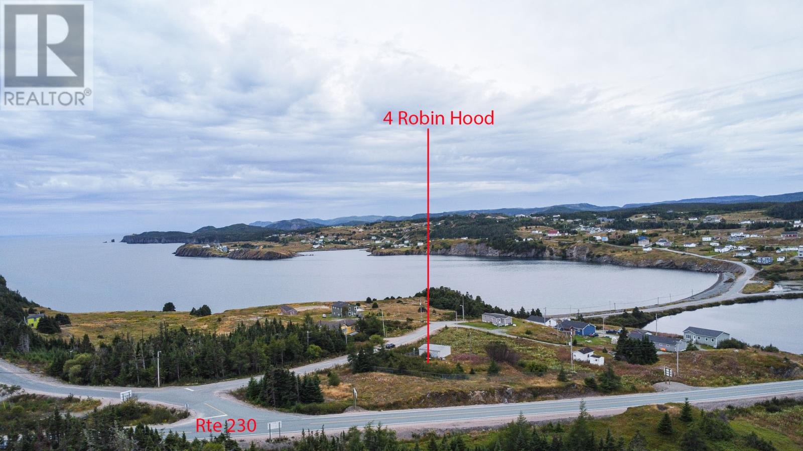 Welcome to an exceptional opportunity in the heart of Port Rexton, a truly special setting overlooking the breathtaking beauty of Robin Hood Bay. This prime parcel is perfectly suited for the nature lover, offering effortless access to the iconic Fox Island Trail and the Skerwink Trail, widely regarded as a must-see for hikers and outdoor enthusiasts alike. Nestled in one of Newfoundland’s most scenic coastal communities, the property currently features a solid structure on site that can easily be converted into a residence or utilized as a spacious garage or workshop. With flexible town zoning in place, the possibilities are impressive, allowing for a single-family dwelling, vacation home, or select commercial uses. Ideally positioned between Robin Hood Bay Road and Route 230, the property benefits from excellent visibility while still maintaining the peaceful charm Port Rexton is known for. Whether you envision a private coastal retreat, an income-generating getaway, or a unique business opportunity, this location offers the perfect balance of exposure, scenery, and lifestyle. A rare chance to secure land in a community celebrated for its natural beauty, trails, and coastal character. (id:48254)
